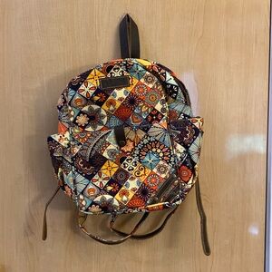 12”x8” beautiful Sixtease small backpack. Like new condition.
